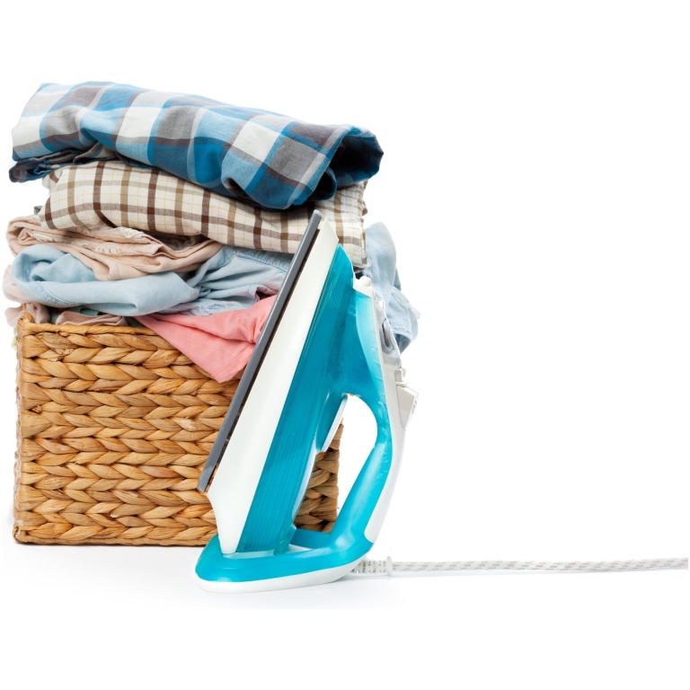 Electric iron and pile of clothes.